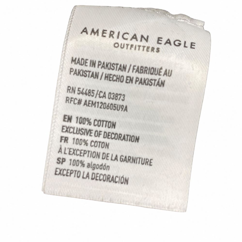 AMERICAN EAGLE OUTFITTERSのM、RN 54485、MADE IN MEXICO、100パーセントCOTTON、OVER FOR CAREタグ