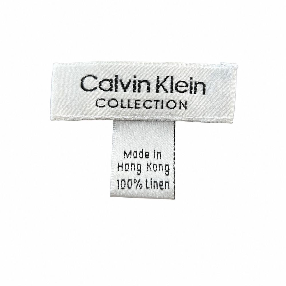 Calvin Klein Jeansスカートのケアタグと98パーセントコットン2パーセントエラスタン、Made in Turkey表示