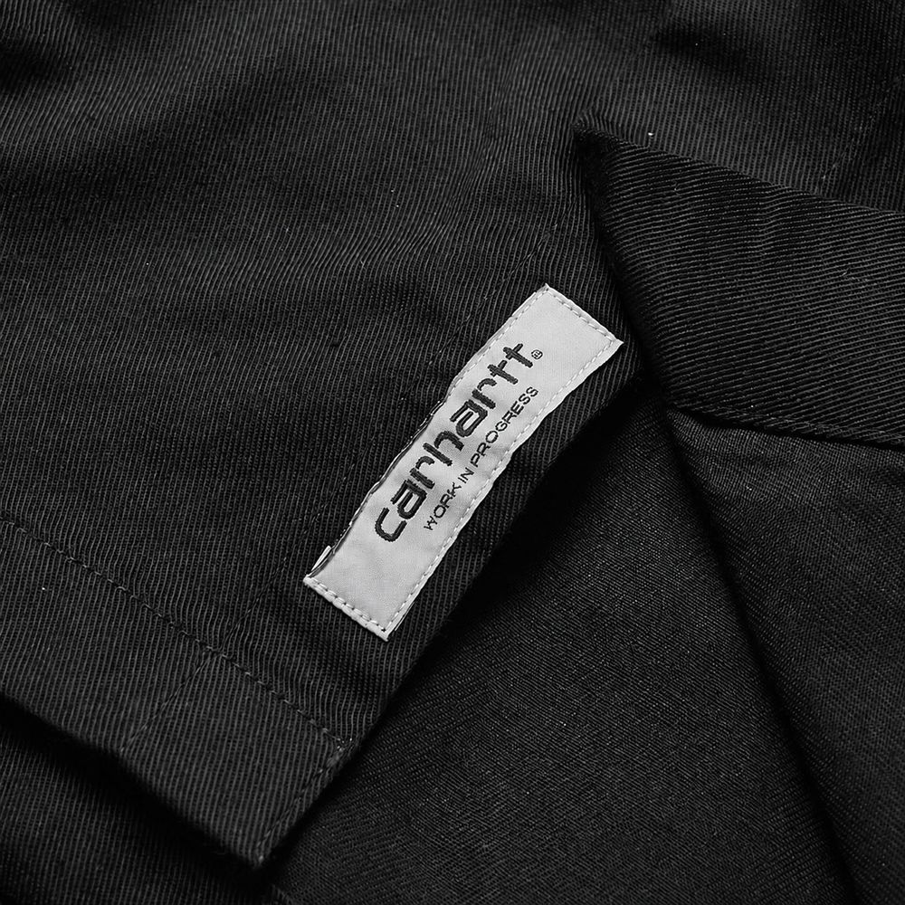 Carhartt WIPの実物タグ資料、競技・用途を示す補助表示があるタグ