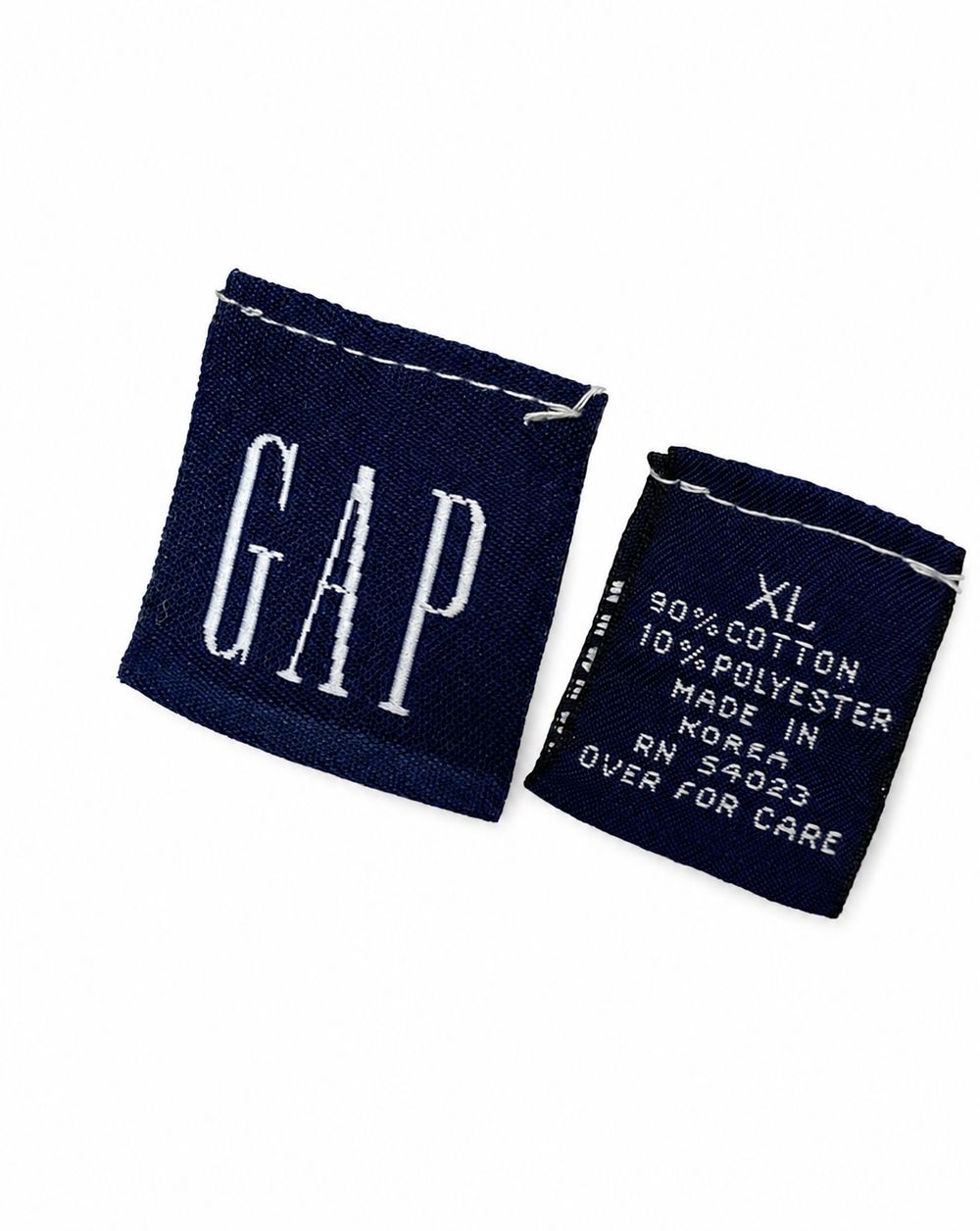 GAPラグビーポロのタグとS、100パーセントコットン、Made in Hong Kong表示