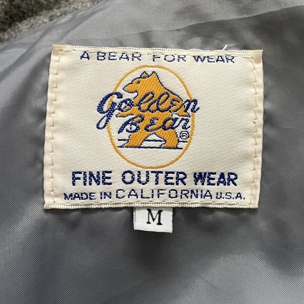 Golden Bearの実物タグ資料、ロゴとサイズ表示が同じラベルに収まる例