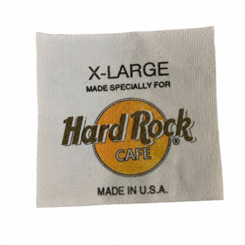 Hard Rock CafeのタグとMade in UAE、100パーセントcotton、RN 78177、CA 33803表示