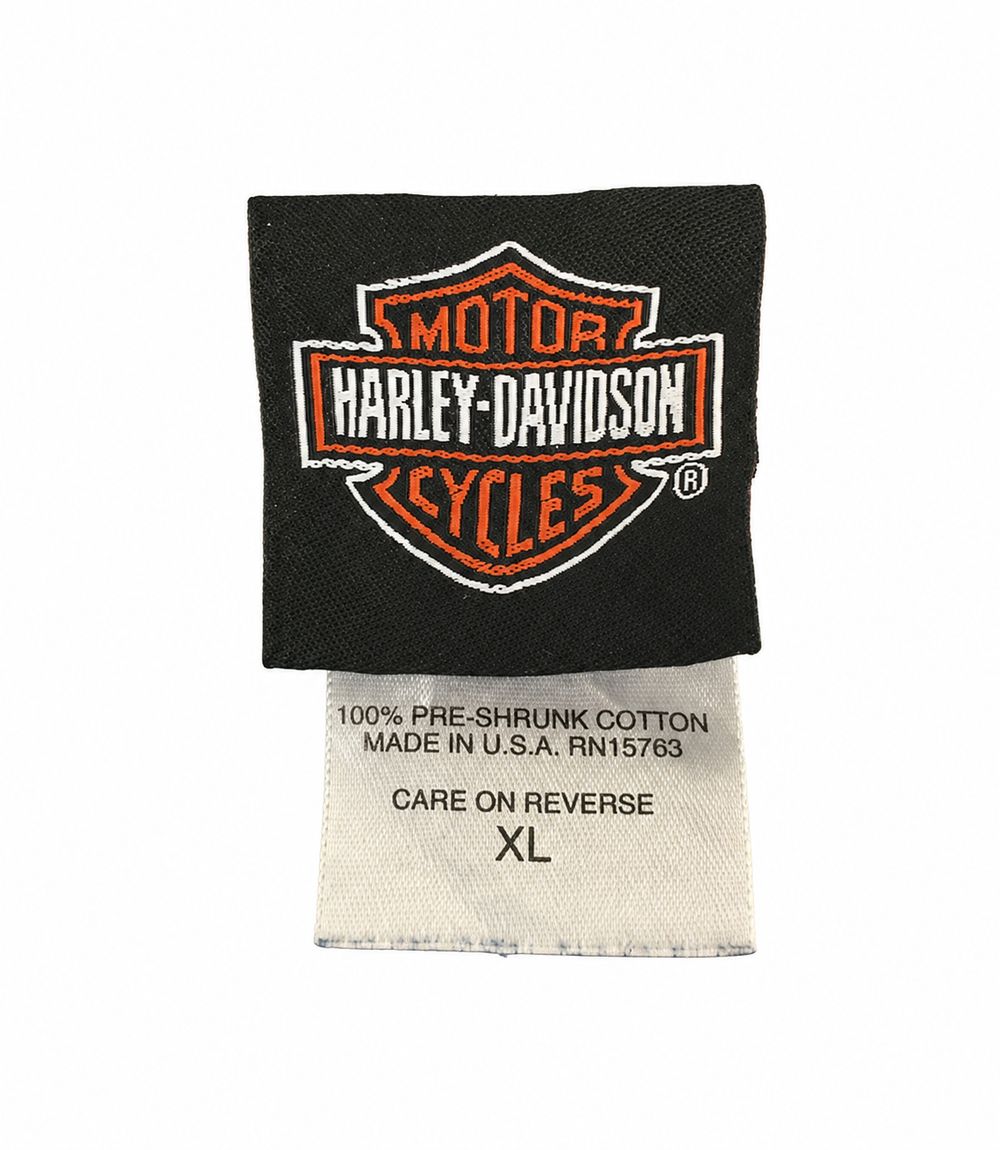 MOTOR HARLEY-DAVIDSON CYCLES、公式ライセンス表示、Milwaukee住所、サイズ36の革ジャケットタグ