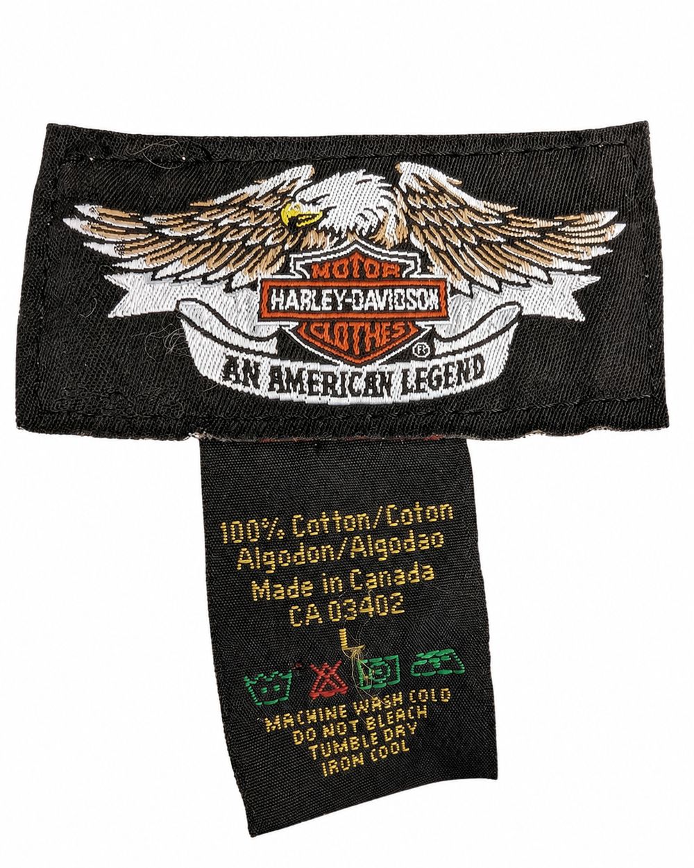 MOTOR HARLEY-DAVIDSON CYCLES、100パーセントCOTTON、MADE IN MEXICO、X-LARGEの長袖タグ