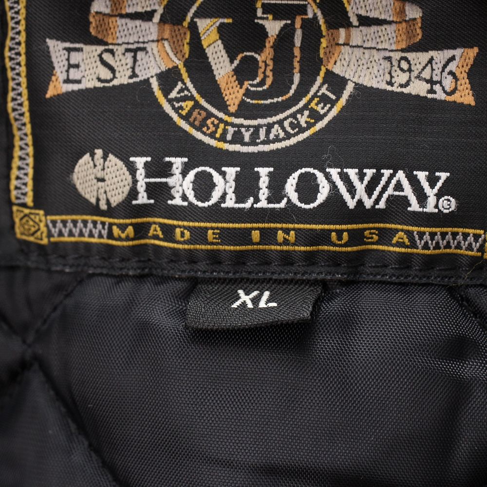 Hollowayの実物タグ資料、ロゴとサイズ表示が同じラベルに収まる例