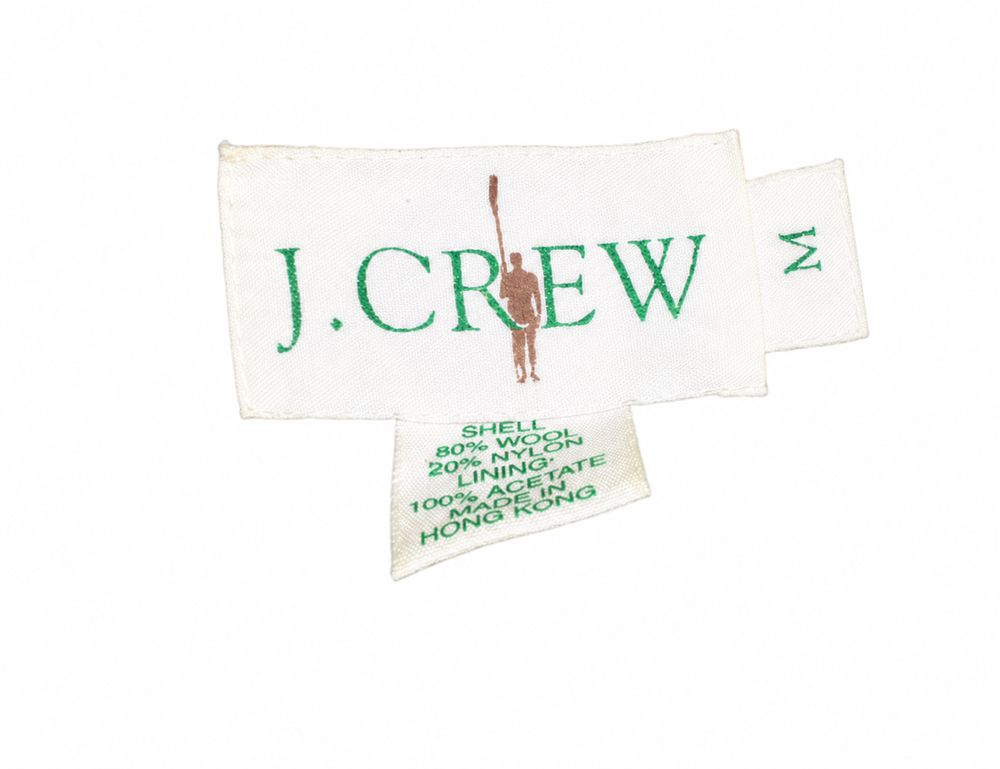 J.CREWのブレザータグと80パーセントウール、20パーセントナイロン、Made in Hong Kong表示