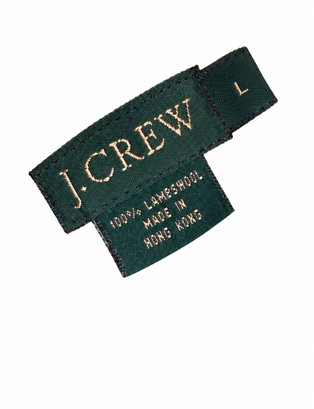 J.CREW 100パーセントLAMBSWOOLとMADE IN HONG KONGのニットタグ