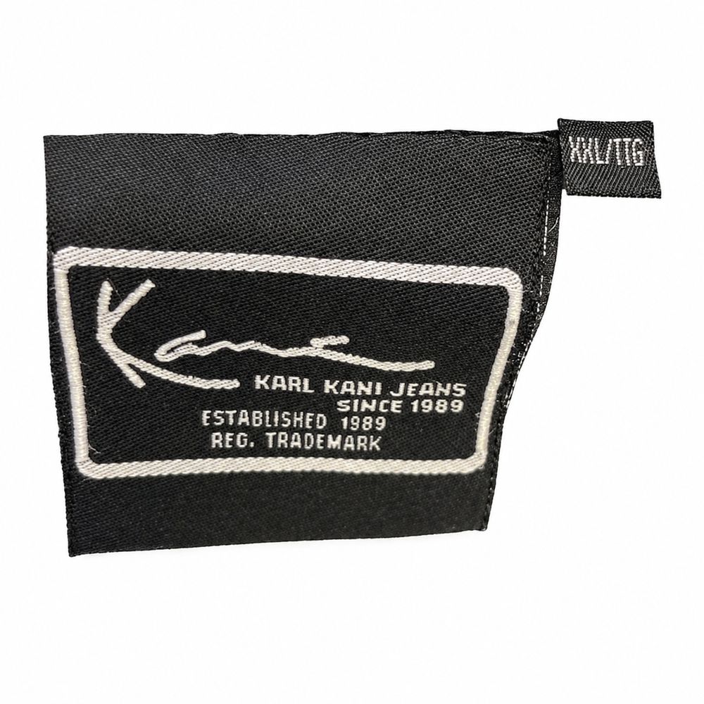 Kani Jeans、The Original、Established Since 1989、Made in Pakistan、L、100パーセントCottonのタグ