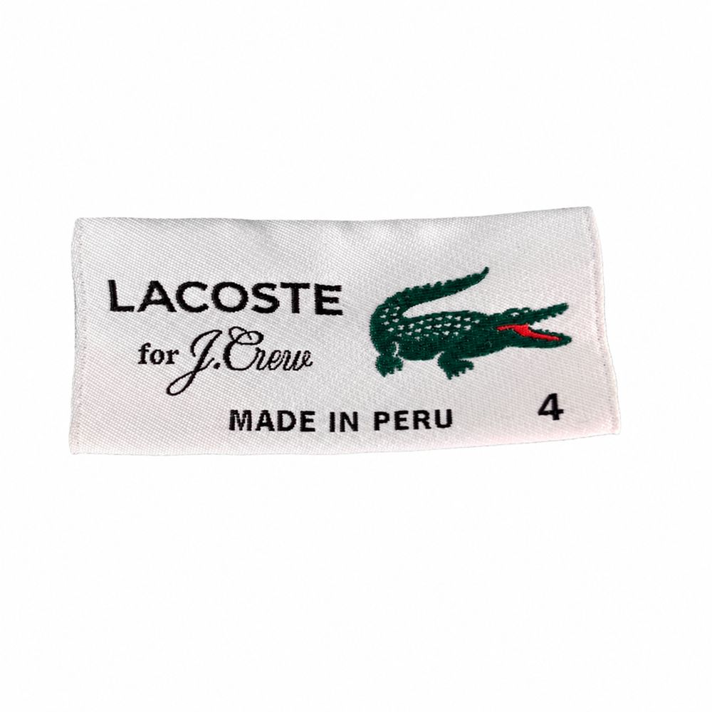 Lacoste LIVEの赤いロゴとサイズ3、Designed in France、Made in Peru表示
