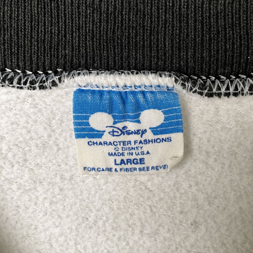 Mickey Mouseの実物タグ資料、プリント式の表示。文字の読める範囲を記録する