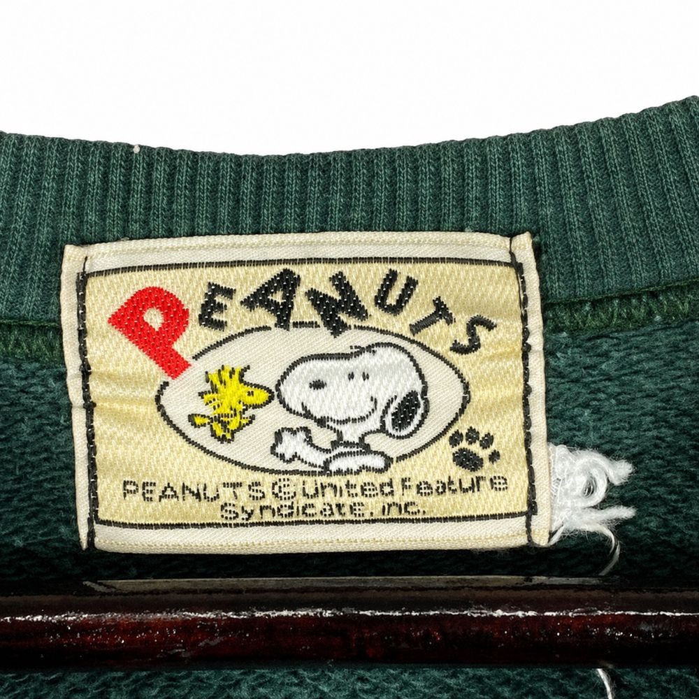 Peanutsの実物タグ資料、ブランドタグ全体。ロゴとタグの取り付け位置を確認する