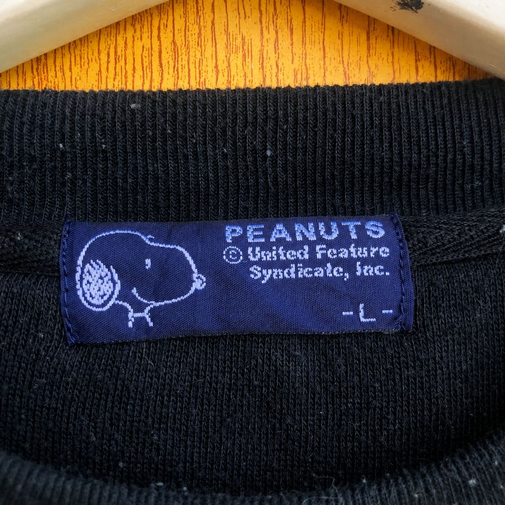 Peanutsの実物タグ資料、生産国や素材表示が近接するタグの例