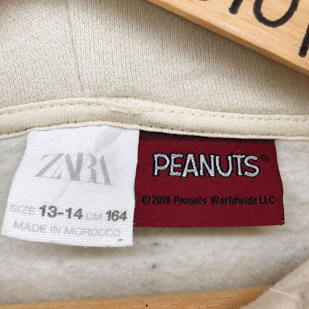 Peanutsの実物タグ資料、ケア表示やサイズ欄を含むタグ周辺