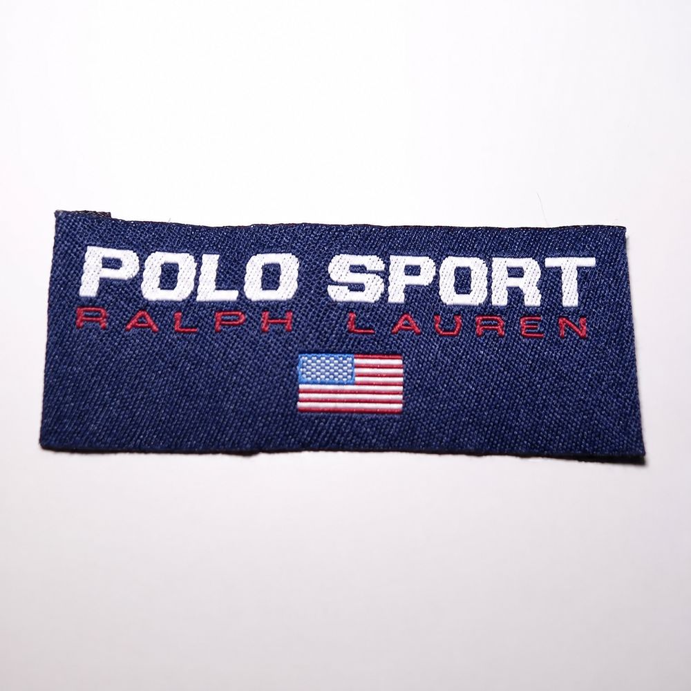 Polo Sportの実物タグ資料、ケア表示やサイズ欄を含むタグ周辺