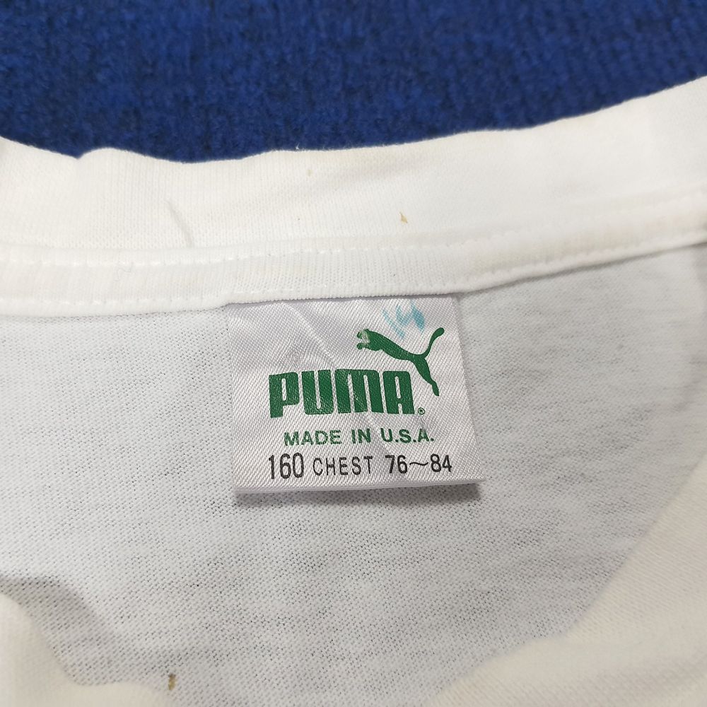 PUMAの実物タグ資料、生産国や素材表示が近接するタグの例