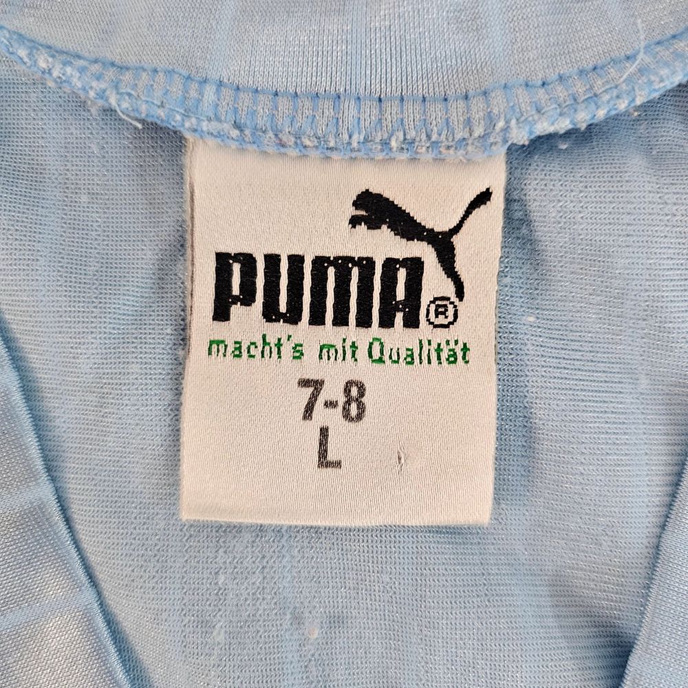 PUMAの実物タグ資料、競技・用途を示す補助表示があるタグ