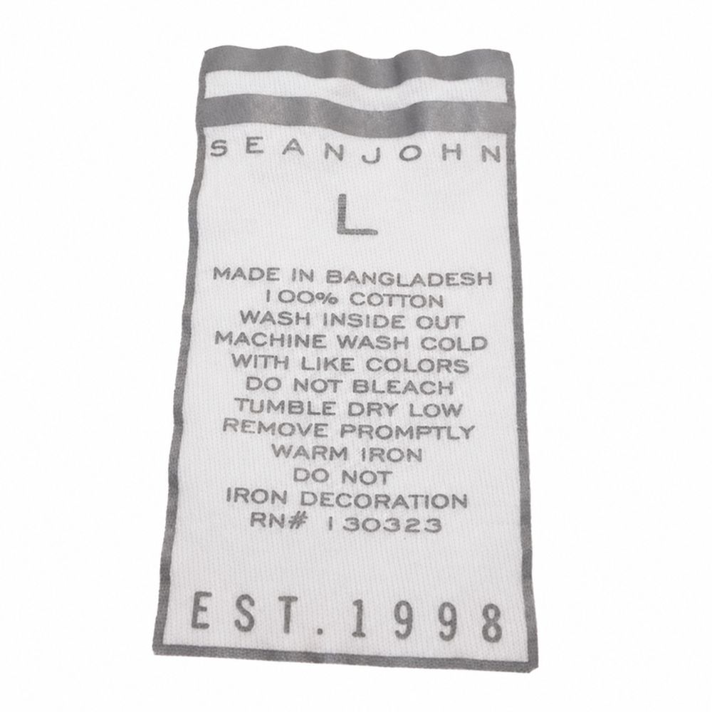 Sean John、サイズL、Made in Bangladesh、100パーセントCotton、RN130323、EST.1998のケアタグ