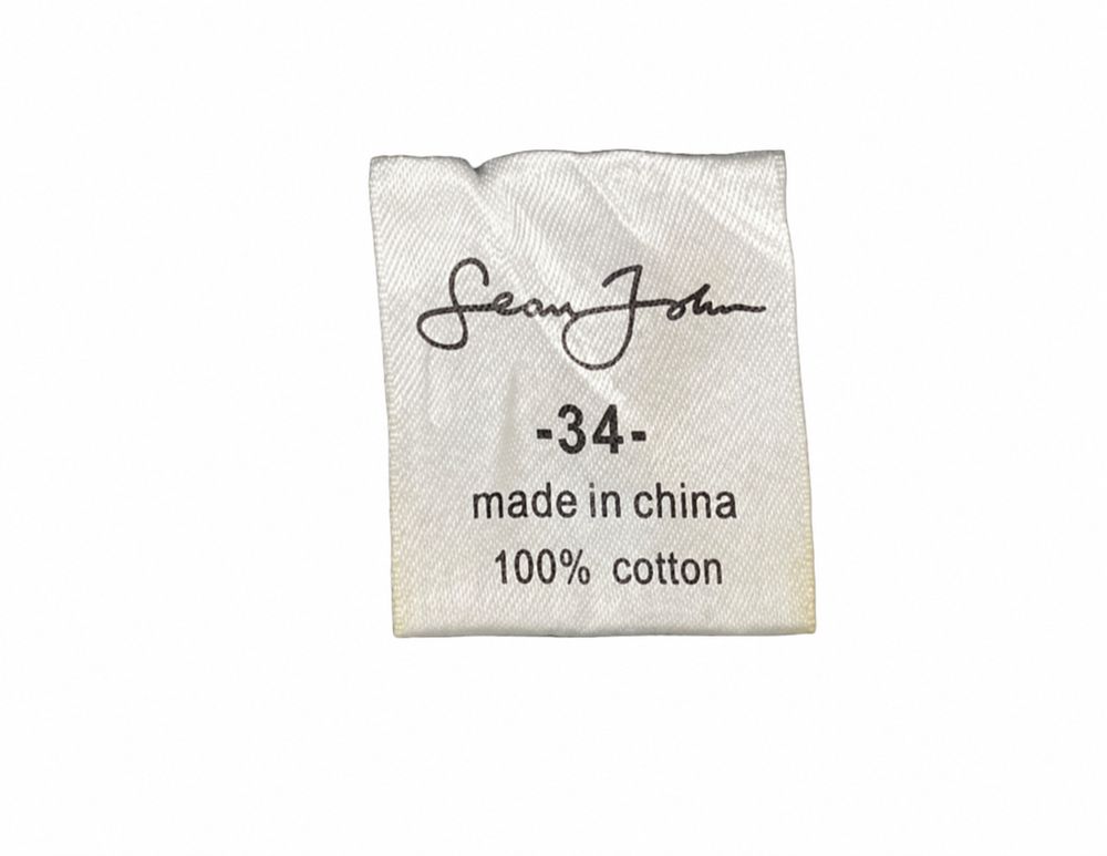 Sean Johnの大きなレザーパッチが縫い付けられたデニム