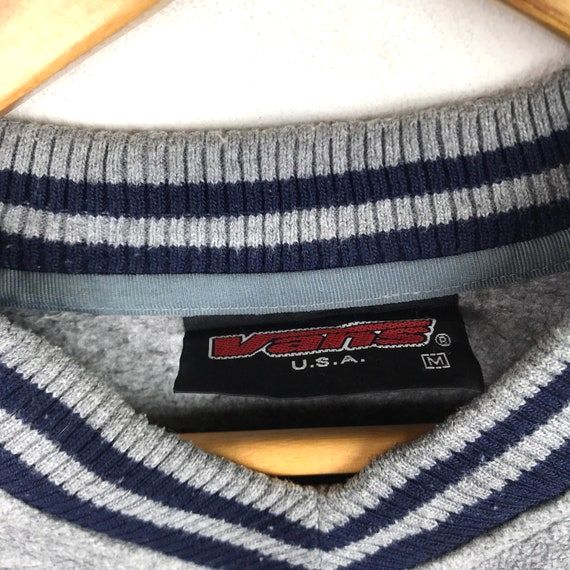 Vansの実物タグ資料、ケア表示やサイズ欄を含むタグ周辺